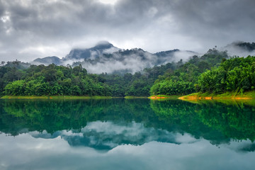 Misty morning on Cheow Lan Lake, Khao Sok National Park, Thailand