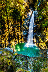 The turquoise waters of Cascade Falls in Cascade Falls Regional Park between the towns of Mission and Deroche in British Columbia, Canada