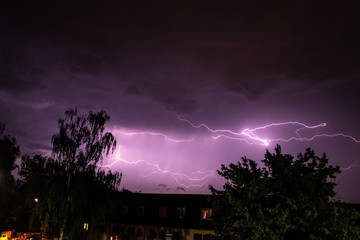 Lightning thunderstorm over city