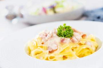 tasty Carbonara pasta on the table