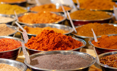 variety of oriental spices in plates for sale
