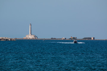Lighthouse near ionian sea (St Andrea Island), Gallipoli, Salento, South Italy