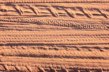 Abstract Vehicle Wheel Tracks on Sand Road
