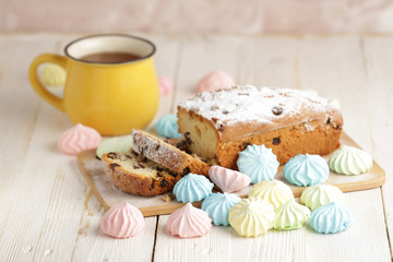 Delicious homemade cake with raisins on a light wooden background. close-up. rustic. copy space.