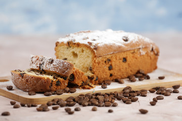 Delicious homemade cake with raisins on a light wooden background. close-up. rustic. copy space.