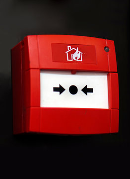 Closeup view of fire safety arrangement,sign and electrical button,break glass in case of fire