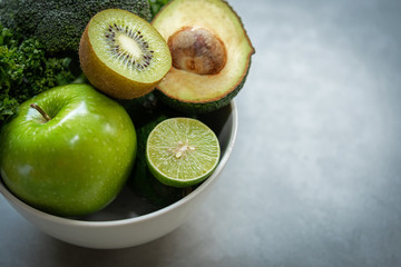 Healthy Foods. Organic and Fresh green vegetable for detox, diet and weight loss on the old wooden. Healthy Concept