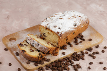 Delicious homemade cake with raisins on a light wooden background. close-up. rustic. copy space.