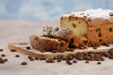 Delicious homemade cake with raisins on a light wooden background. close-up. rustic. copy space.