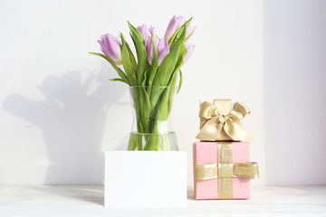 Multy purpose fresh flower composition, bouquet of purple tulips. International Women's day, mother's day greeting concept. Copy space, close up, top view, flat lay, background.