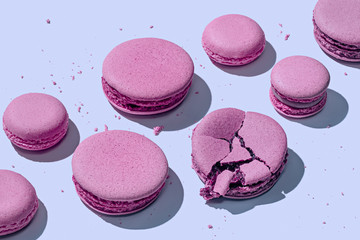 Lilac macarons on pastel blue background