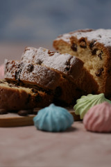Delicious homemade cake with raisins on a light wooden background. close-up. rustic. copy space.