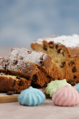 Delicious homemade cake with raisins on a light wooden background. close-up. rustic. copy space.