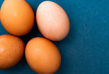  raw eggs on a natural background