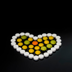 heart of colored pills