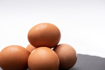  raw eggs on a natural background
