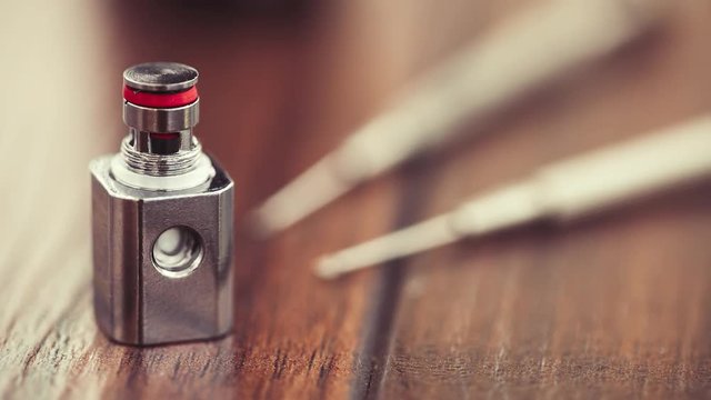 Repair,maintenance vaping device mod.Upgrade parts for modern vaporizer e-cig device,spare parts.Micro coil clearomizer.Quit smoking nicotine cigarette,start vaping safe ecig vape