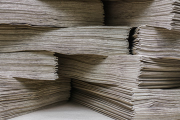 Side View Of Huge Stack of Recycled Paper close up. Business concept. Huge Stack of Recycled Paper envelopes closeup. Eco Kraft paper.
