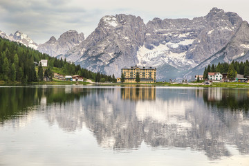 Dolomites Mountains reflection in lake Misurina, Italy