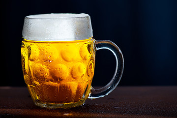 Glass of beer isolated on the white background