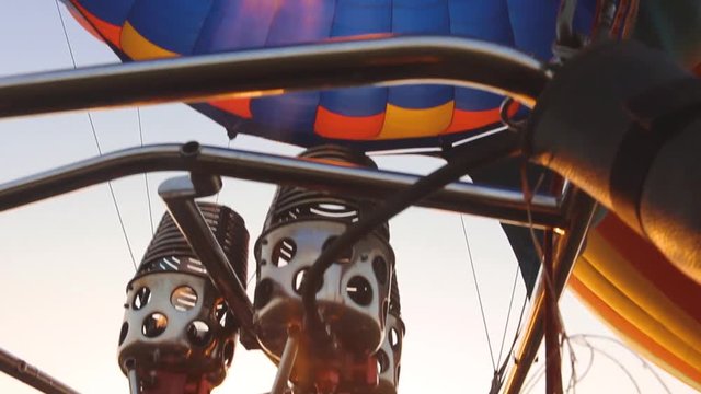 Hot air balloon, at sunrise. Flying in the field. Hot air balloon fire engine.