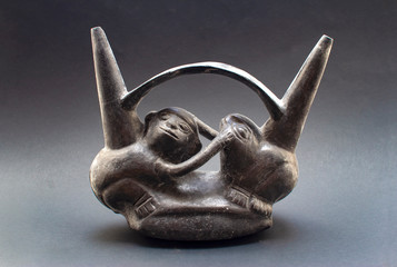 Pre-columbian pottery called "Huaco" from Chimu, an ancient Peruvian culture. Pre inca handcrafted pottery piece made by this ancient civilization.