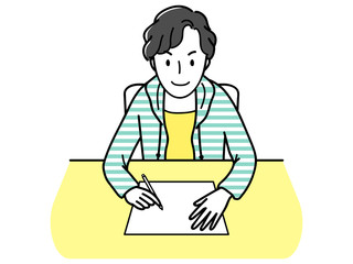 何かを書く中学生