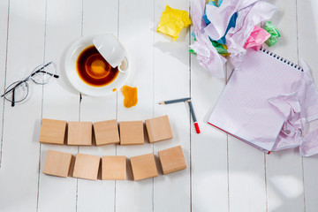 Message in wooden cubes on a table background. Lifestyle, business, office, motivation, plan, stress and management concept. Top or flat lay view. Conceptual image with copy or negative space and mock