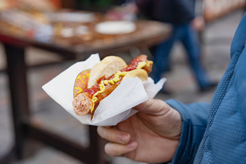 hot-dog in hand