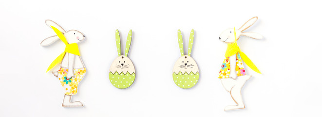 Easter background. Traditional eggs and rabbit. Festive decoration isolated on white.Copy space for Text.