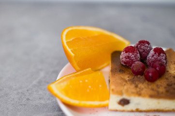 orange and berry pie on a plate
