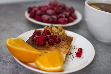 orange and berry pie on a plate