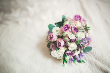 Wonderful luxury wedding bouquet of different flowers