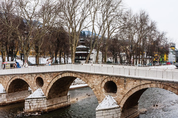 Fototapeta na wymiar Latinska kuprija the Latin Bridge crossing the Miljacka river central Sarajevo city. Bosnia and Herzegovina