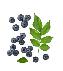 Top view of Blueberries with green leaves closeup, isolated on white background