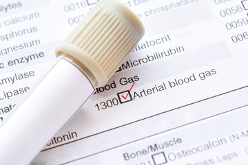 Blood sample tube with laboratory requisition form for arterial blood gas test