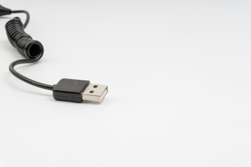 Universal recharger head isolated on white background. Selective focus and crop fragment