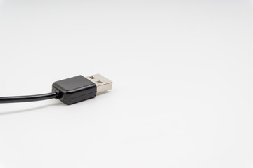 Fototapeta premium Universal recharger head isolated on white background. Selective focus and crop fragment