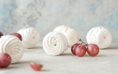 Homemade zephyr and mint on an old wooden table covered 