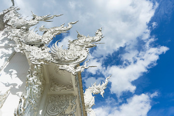 View of the Buddhist temple Wat Rong Khun (White Temple) on a sunny day