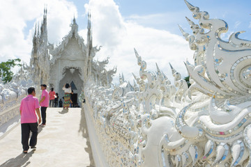 View of the Buddhist temple Wat Rong Khun (White Temple) on a sunny day