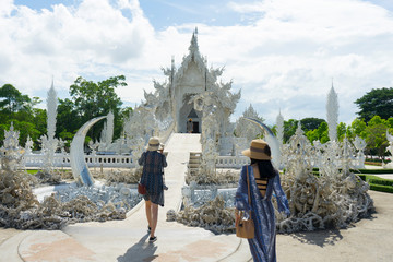View of the Buddhist temple Wat Rong Khun (White Temple) on a sunny day