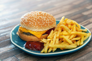 Cheese burger - American cheese burger with Golden French fries