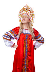 Fototapeta premium Traditional Russian folk costume, portrait of a young beautiful girl