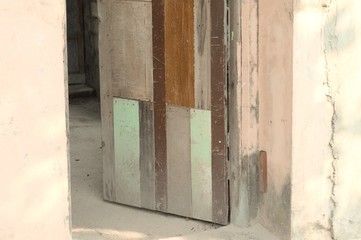 Wooden door of an abandoned house (Ari Atoll, Maldives)
