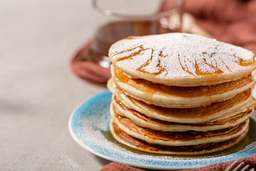 Pancakes Close Up, Delicious breakfast of pancakes with honey and sugar powder, close up view