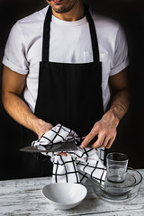 Fototapeta na wymiar Restaurant chef working. Holding knife.