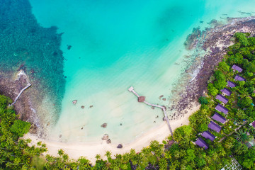 White sand beach clear turquoise sea water with coconut palm tree