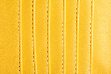 Yellow leather small wallet pockets texture.