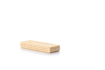 Multi-layered waffles with white creamy filling isolated on white background.